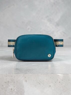 Lululemon Everywhere Belt Bag Wordmark Crossbody Bag in Warp Teal & Gold NWT